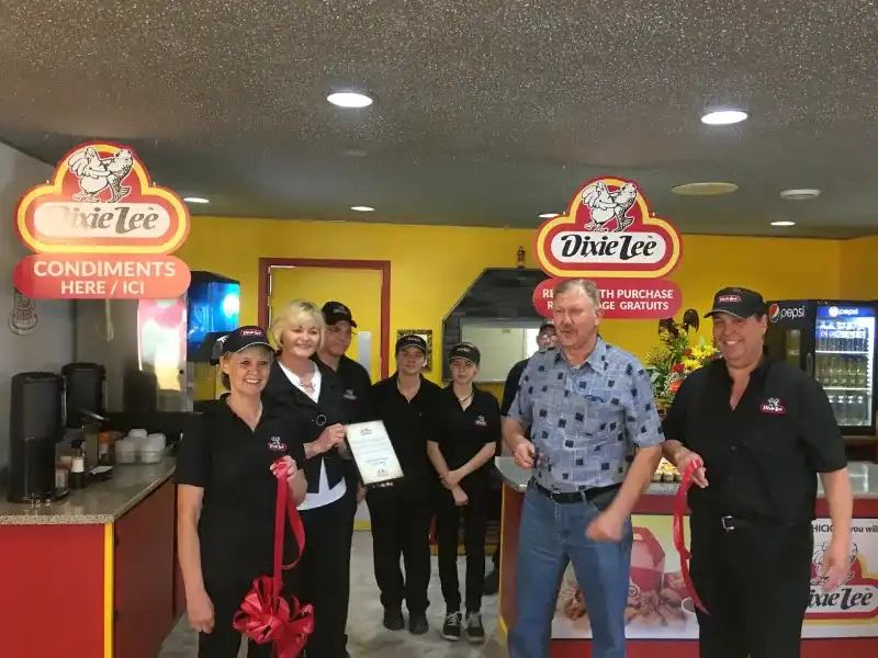Restaurant team celebrating inside Dixie Lee.