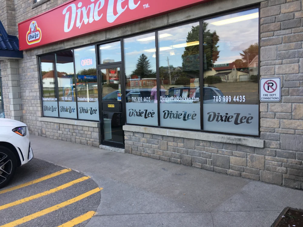 Dixie Lee restaurant exterior with signage and windows.